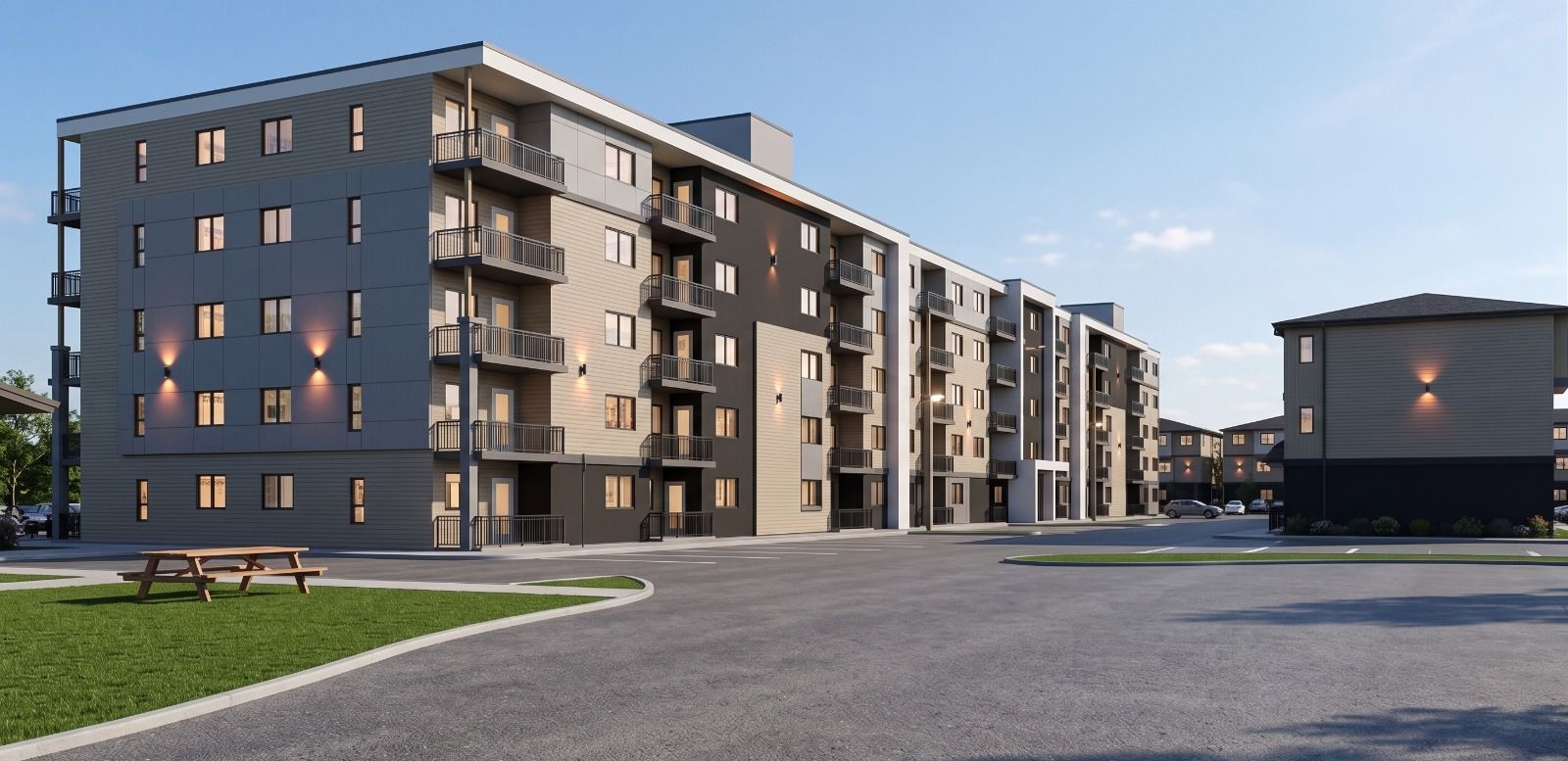 Five-storey Skyview apartment building with balconies and mixed grey and dark facades at dusk