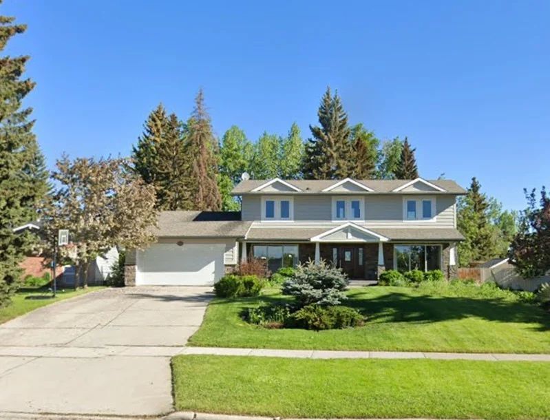 Willingdon home before the addition: original two-storey with attached single garage